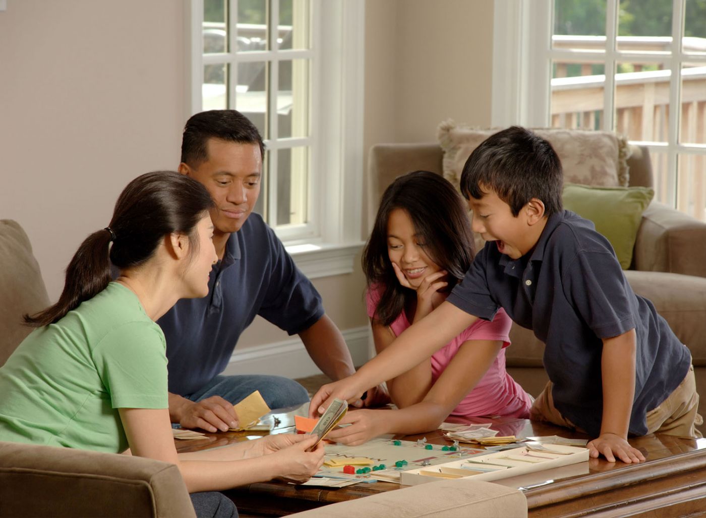 Family playing boardgames together